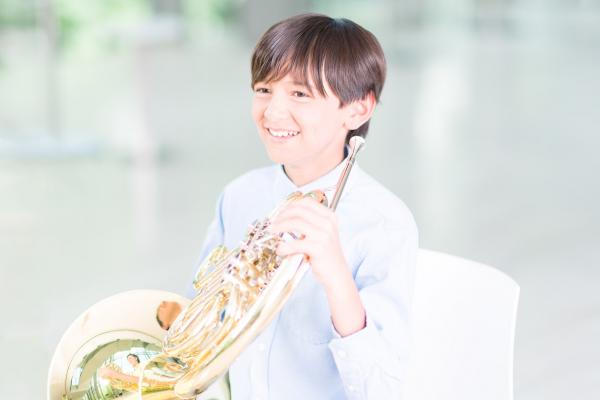Why take an Exam - boy with French horn